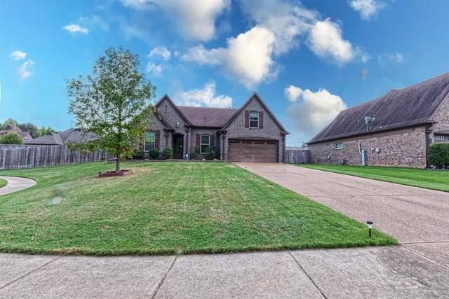 a house view with a garden space