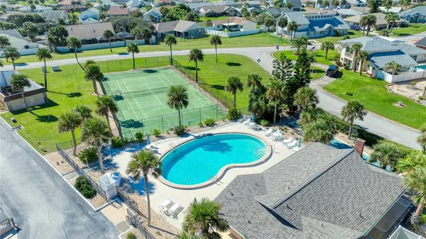 a view of a house with a swimming pool