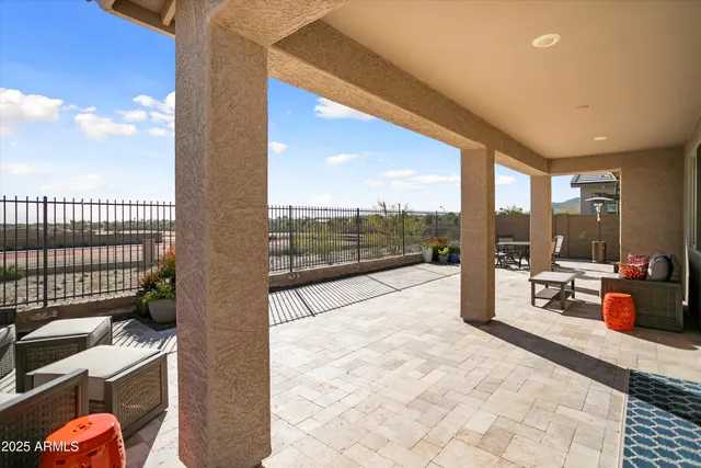 a view of a house with sitting area and furniture