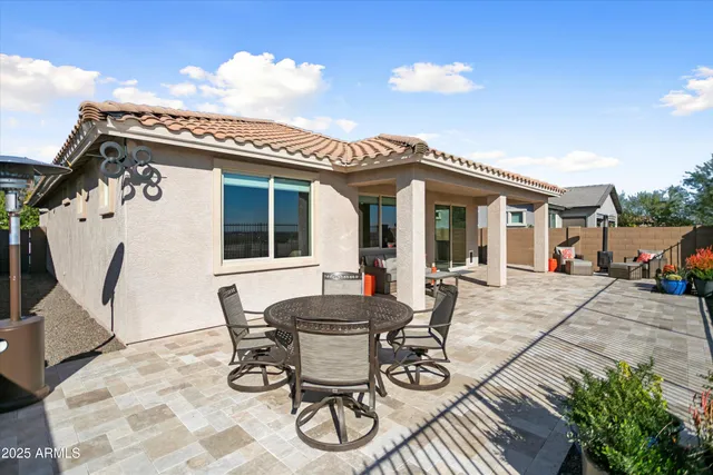 a view of a yard with a mountain