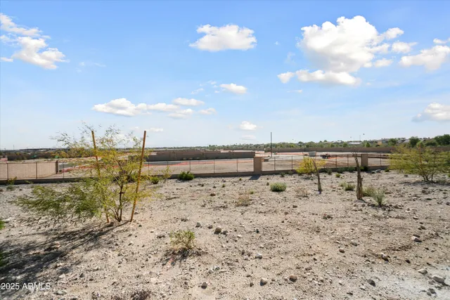a view of outdoor space with garden and lots of trees