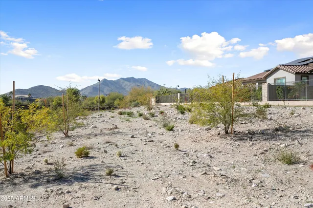 a front view of a building with a road