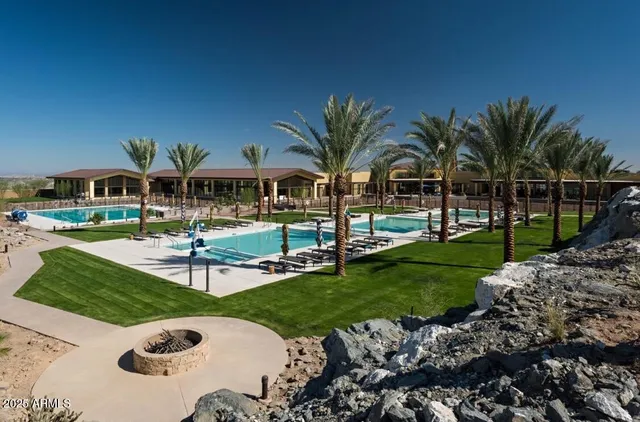 a view of balcony with a yard and mountain view
