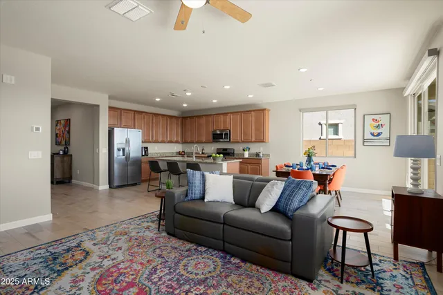 a kitchen with a dining table and chairs