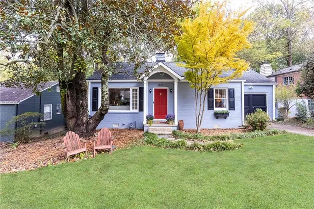 front view of a house with a yard