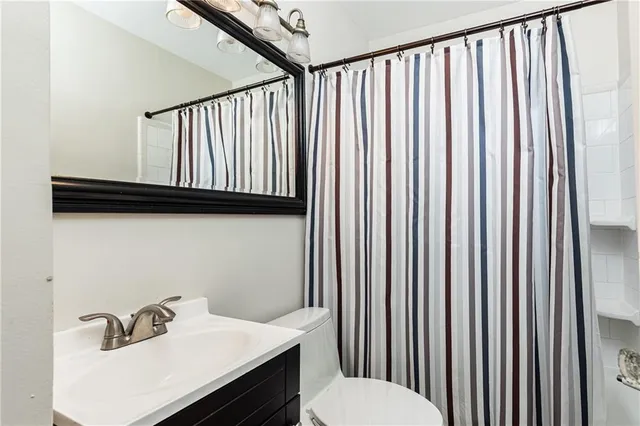 a bathroom with a sink and a toilet