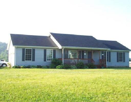 1438 Mill Iron Road Goodview, VA 24095 - Photo 1 of 1 a view of a yard in front of house