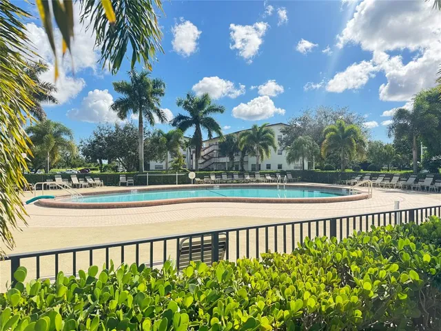 a view of a lake and a yard