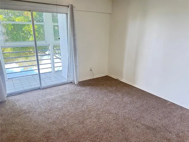 an empty room with sliding door