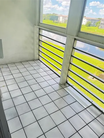 a view of a room and window