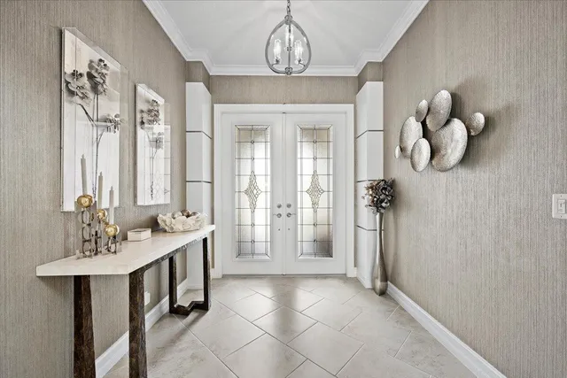 a kitchen with granite countertop a sink a stove and cabinets