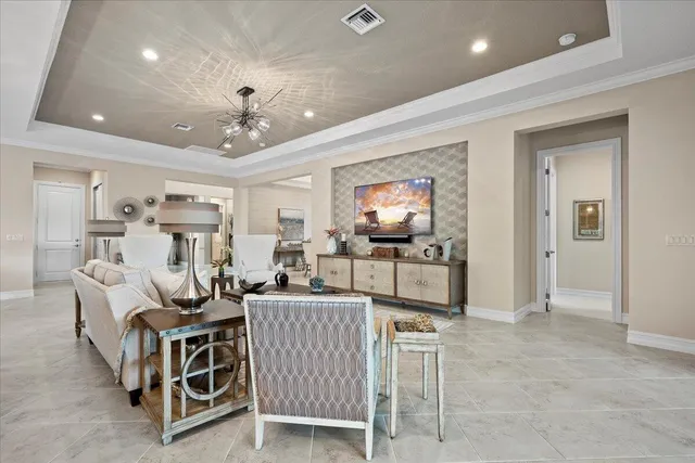 a view of a dining room with furniture and window
