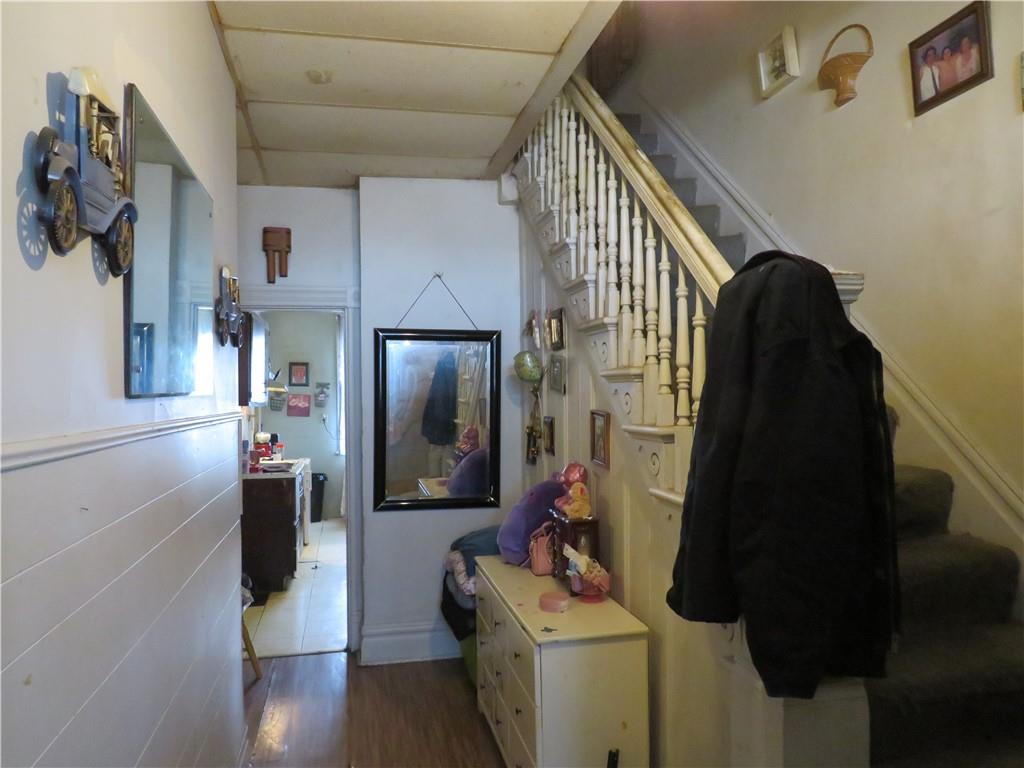 1214 Amanda Street Pittsburgh, PA 15210 - Photo 3 of 19 a view of entryway and hall with wooden floor
