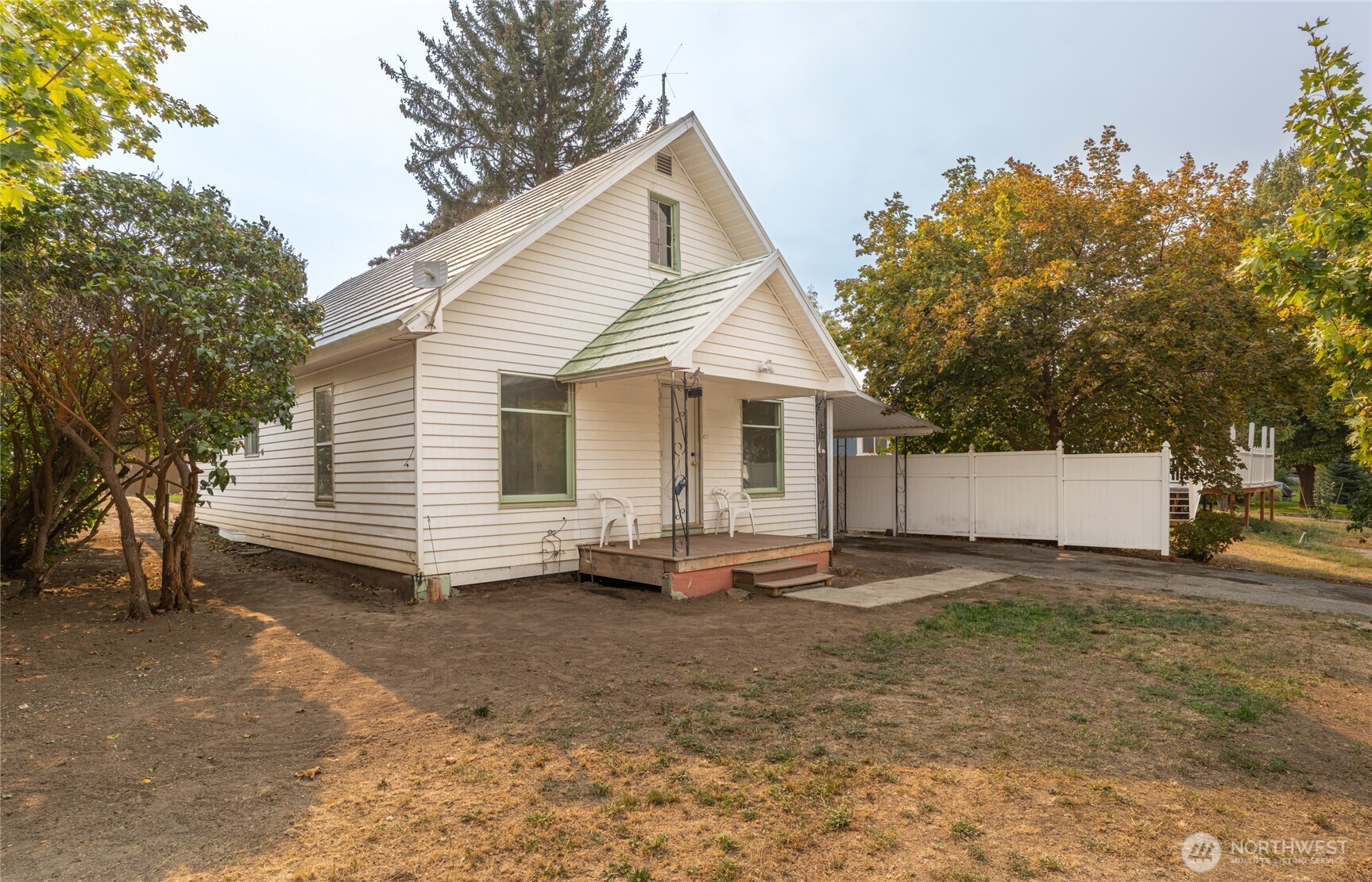 800 East Locust Street Waterville, WA 98858 - Photo 18 of 26 a view of a house with a yard