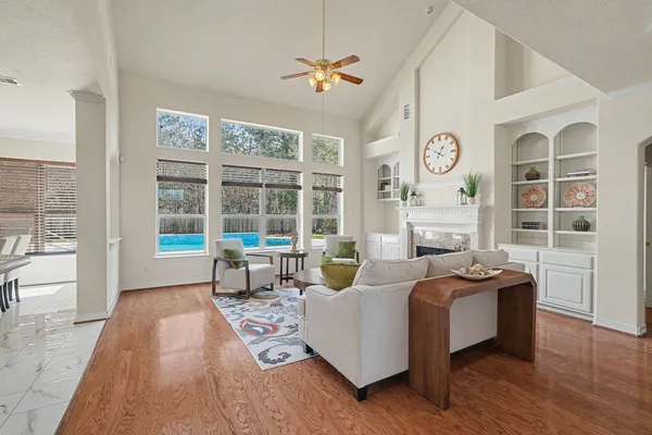 a living room with furniture and a window