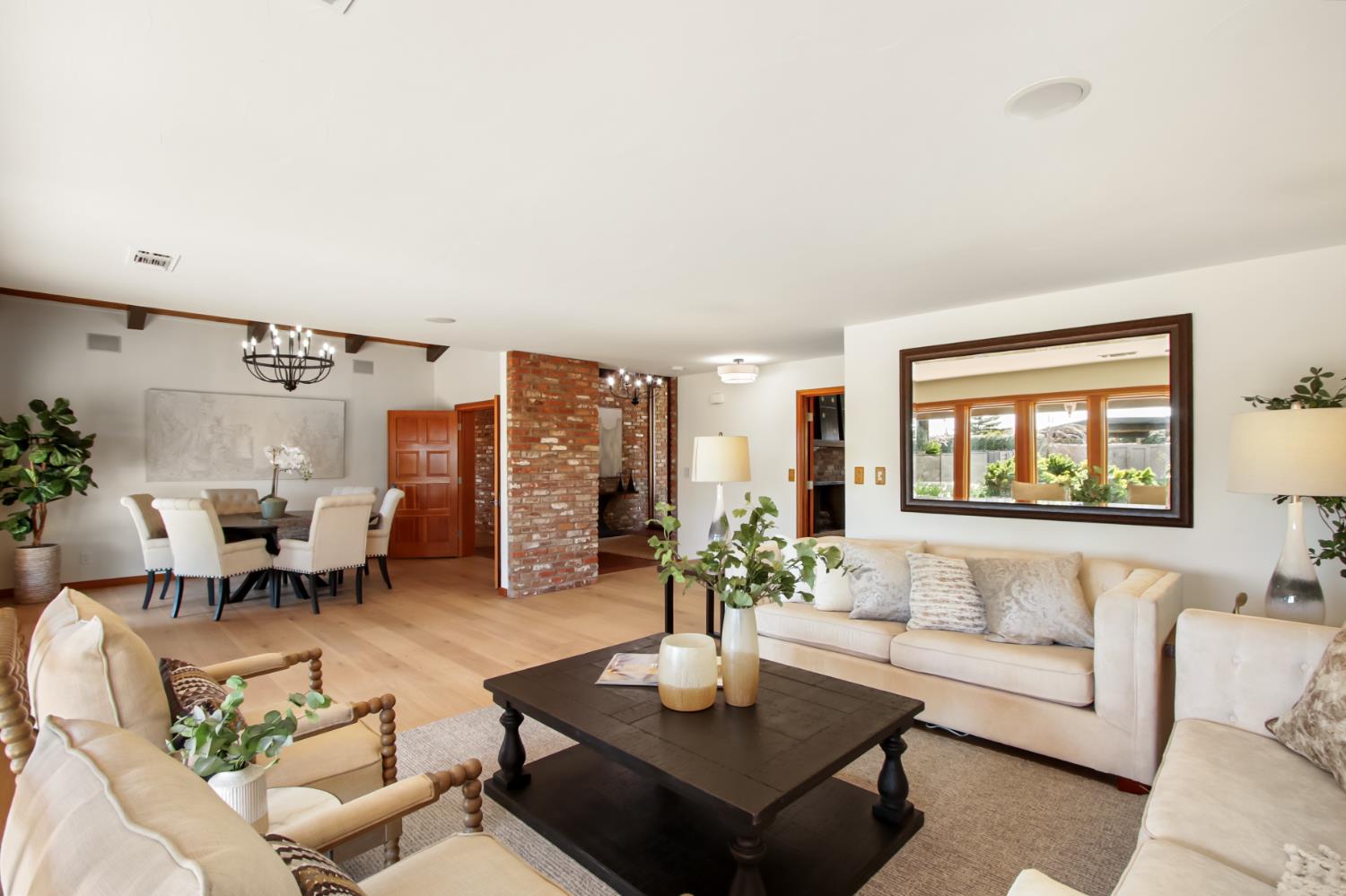 38385 Larue Way Davis, CA 95616 - Photo 16 of 89 a living room with furniture and a large window
