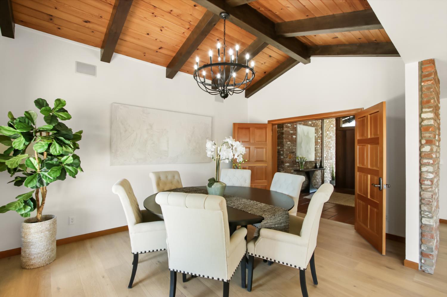 38385 Larue Way Davis, CA 95616 - Photo 18 of 89 a dining room with furniture potted plants and wooden floor