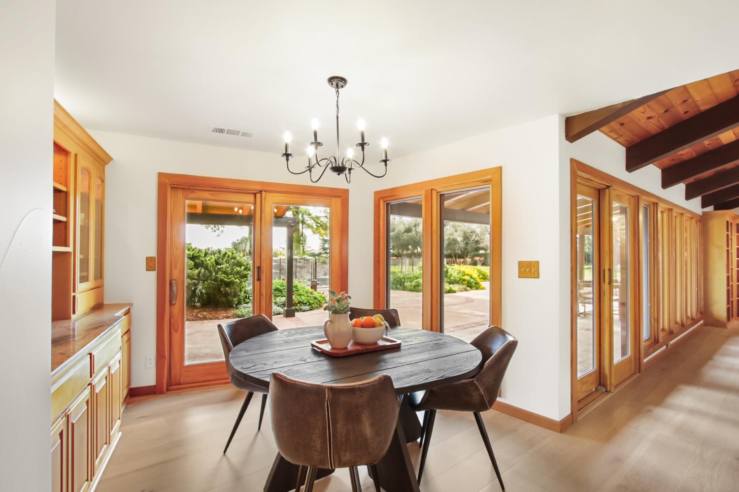 38385 Larue Way Davis, CA 95616 - Photo 35 of 89 a view of a dining room with furniture window and outside view
