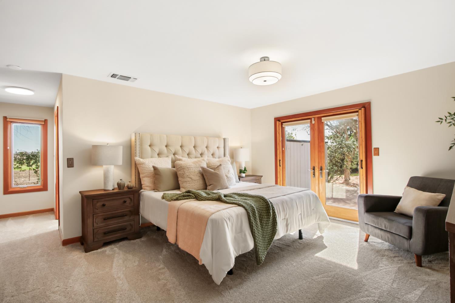 38385 Larue Way Davis, CA 95616 - Photo 36 of 89 a bedroom with a bed and a large window