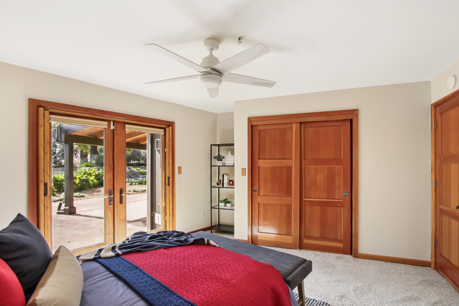 38385 Larue Way Davis, CA 95616 - Photo 44 of 89 a bedroom with a bed and a chandelier