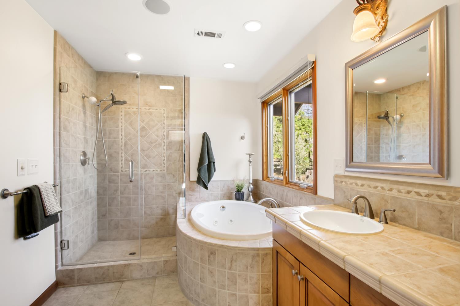 38385 Larue Way Davis, CA 95616 - Photo 45 of 89 a bathroom with a sink double vanity and a shower