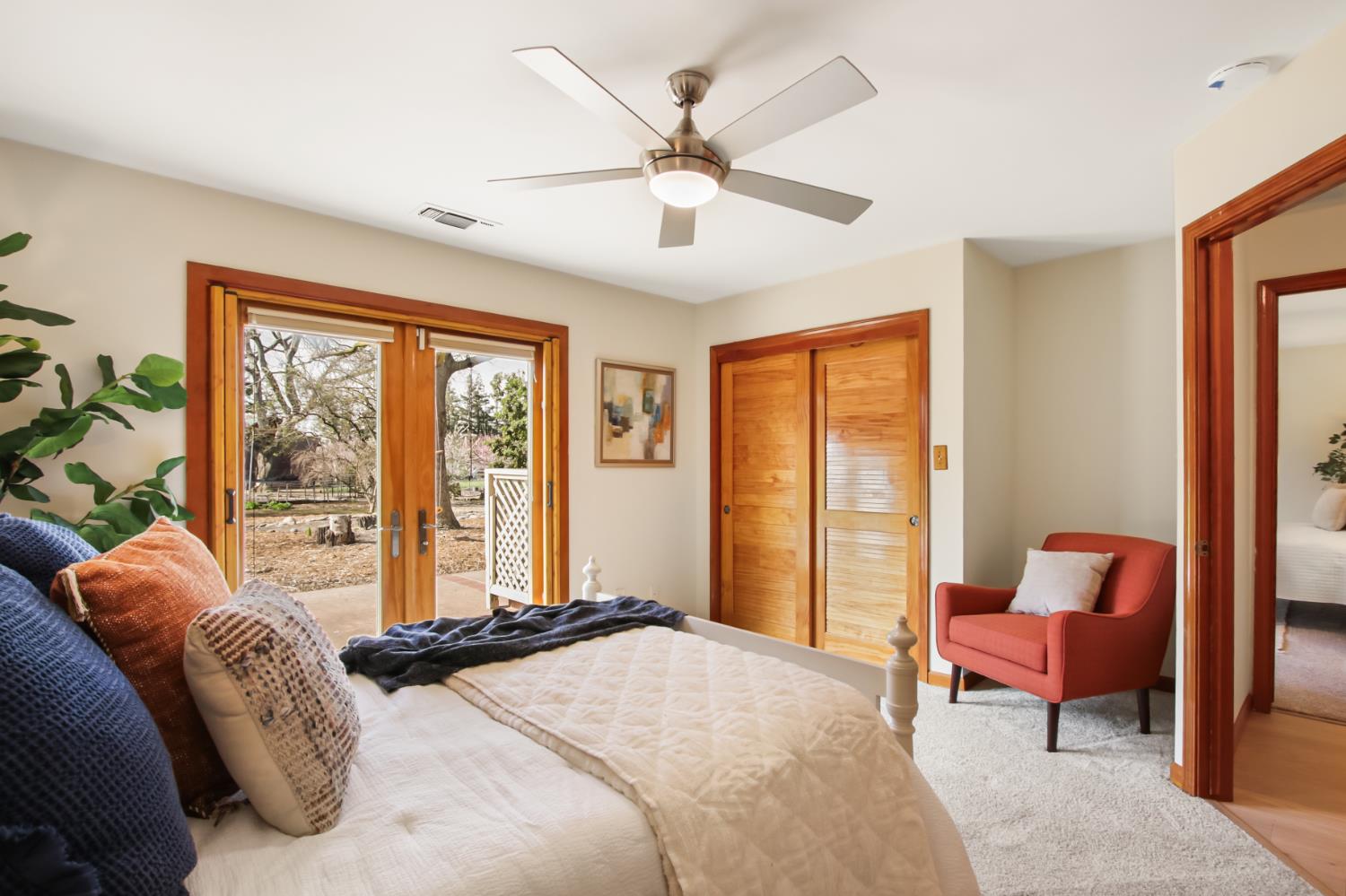 38385 Larue Way Davis, CA 95616 - Photo 50 of 89 a bedroom with a bed and glass windows