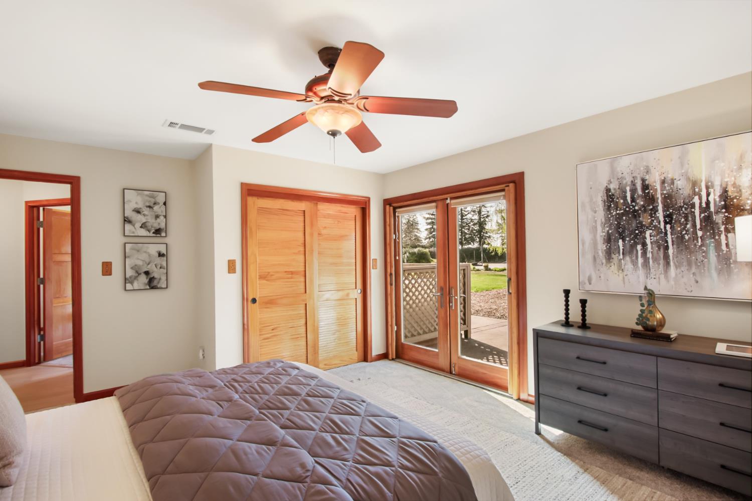 38385 Larue Way Davis, CA 95616 - Photo 54 of 89 a bedroom with a bed and a chandelier