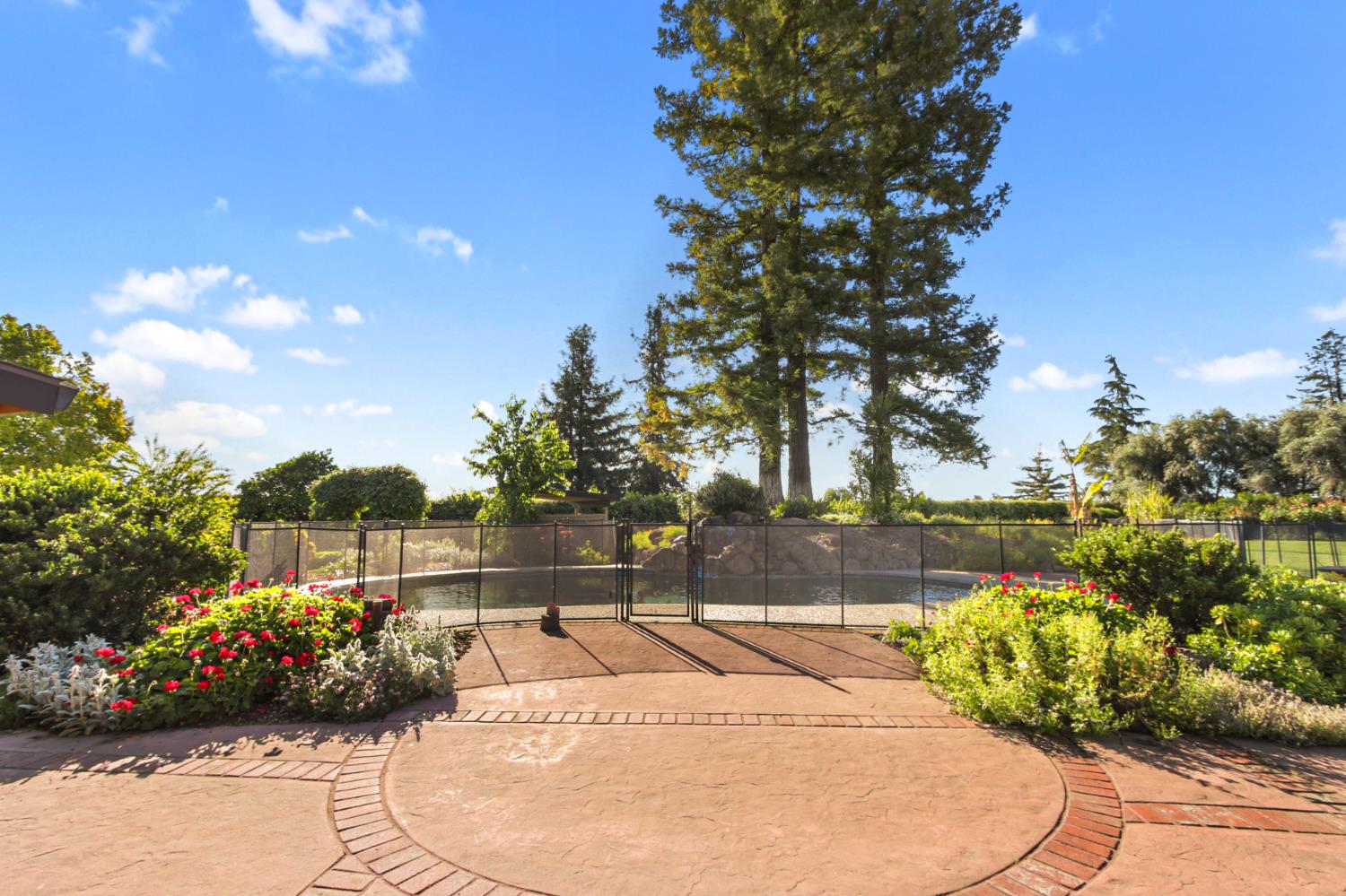 38385 Larue Way Davis, CA 95616 - Photo 59 of 89 a view of a fountain in the backyard of a building