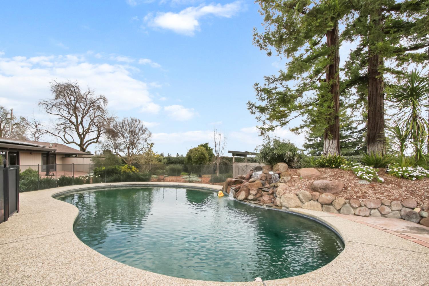 38385 Larue Way Davis, CA 95616 - Photo 62 of 89 a view of a wooden floor with a lake