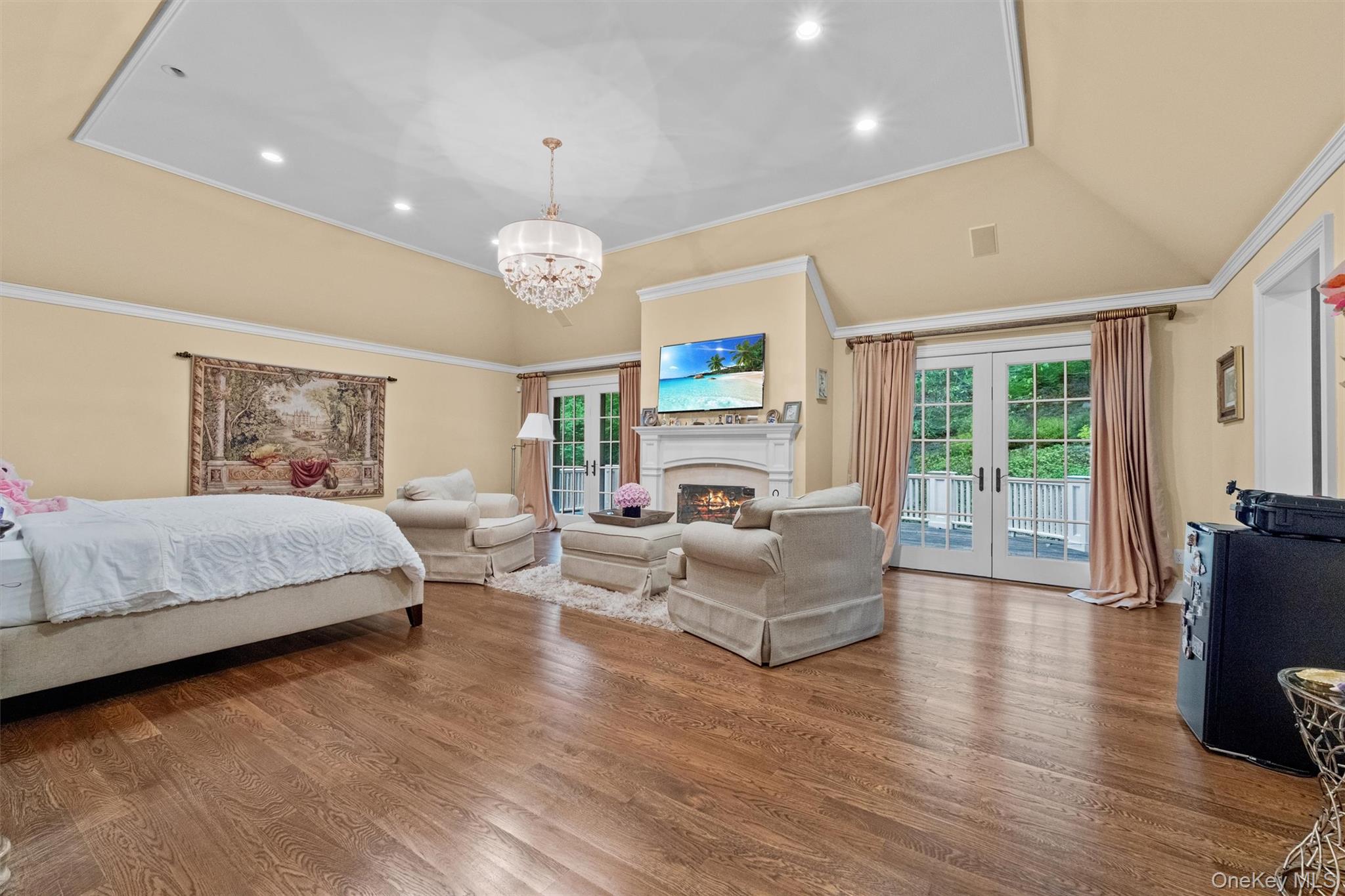 7 Ridgeview Circle Armonk, NY 10504 - Photo 16 of 35 a spacious bedroom with a bed window and couch