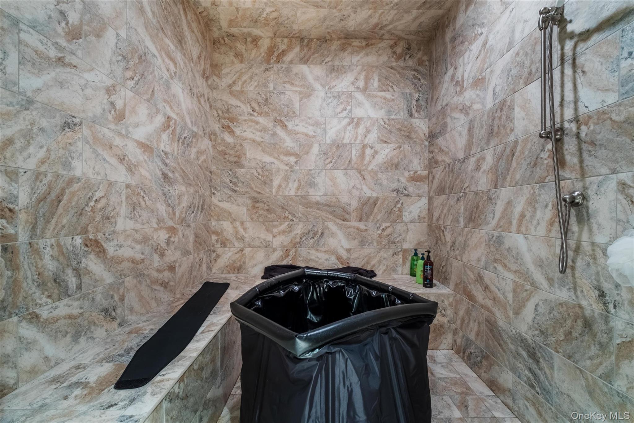 7 Ridgeview Circle Armonk, NY 10504 - Photo 25 of 35 a view of barbeque grill with granite wall