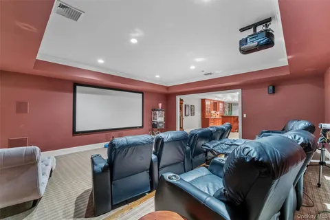 a living room with furniture and a projector