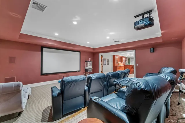 a living room with furniture and a projector