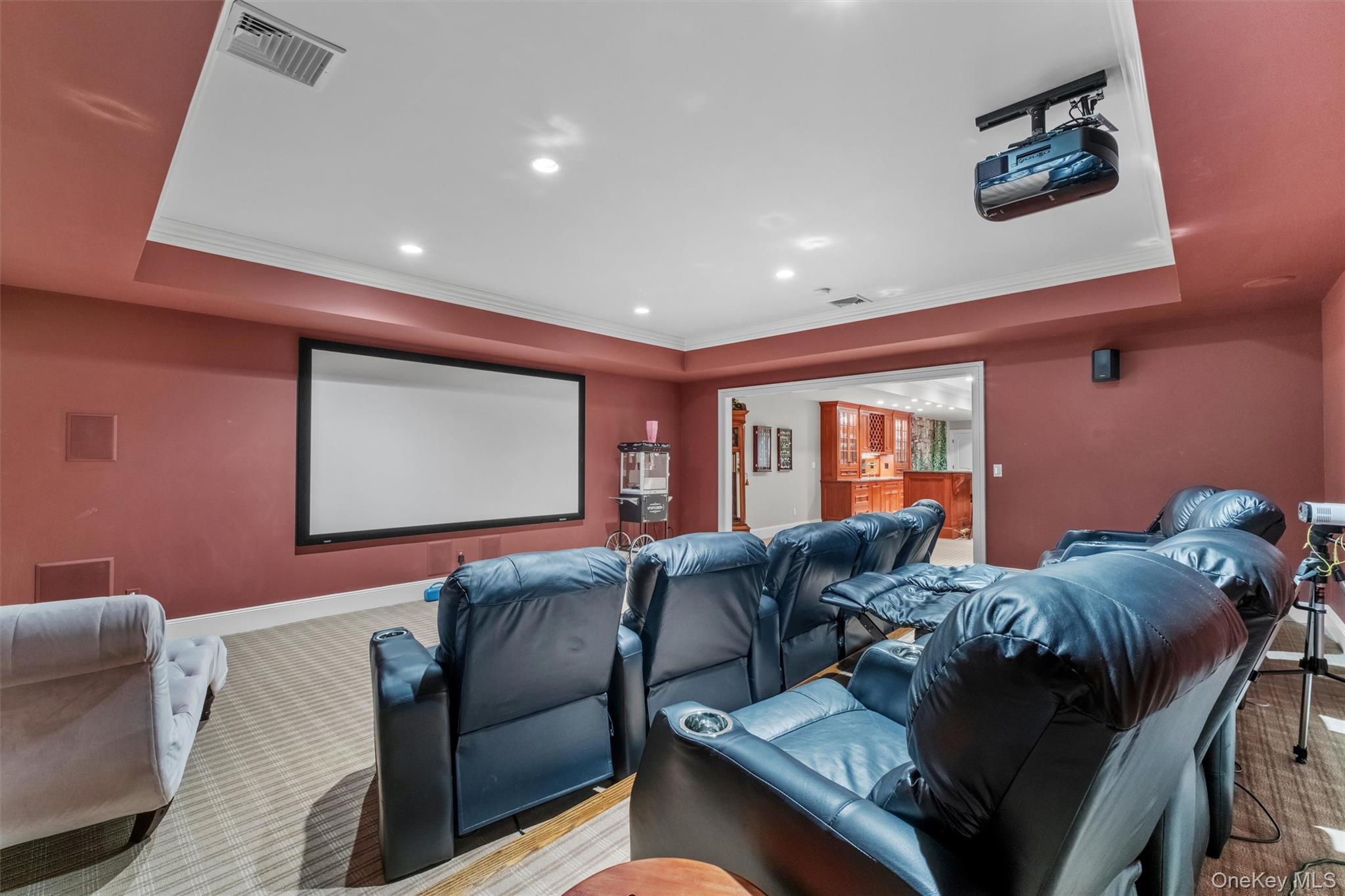 7 Ridgeview Circle Armonk, NY 10504 - Photo 26 of 35 a living room with furniture and a projector