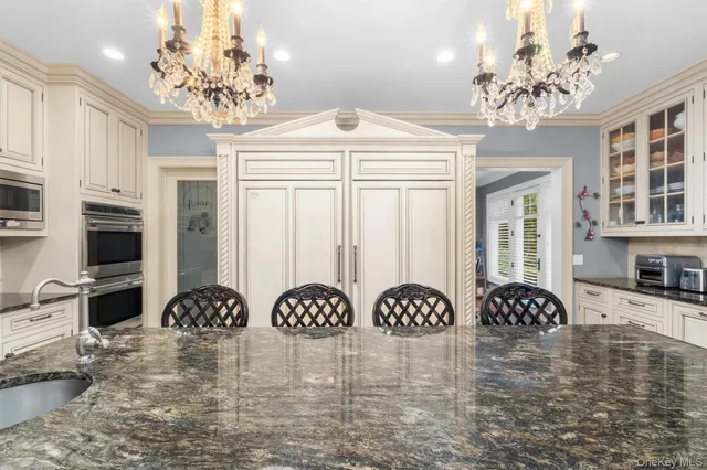 a view of a chandelier in a livingroom