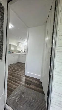 a view of entryway with a front door