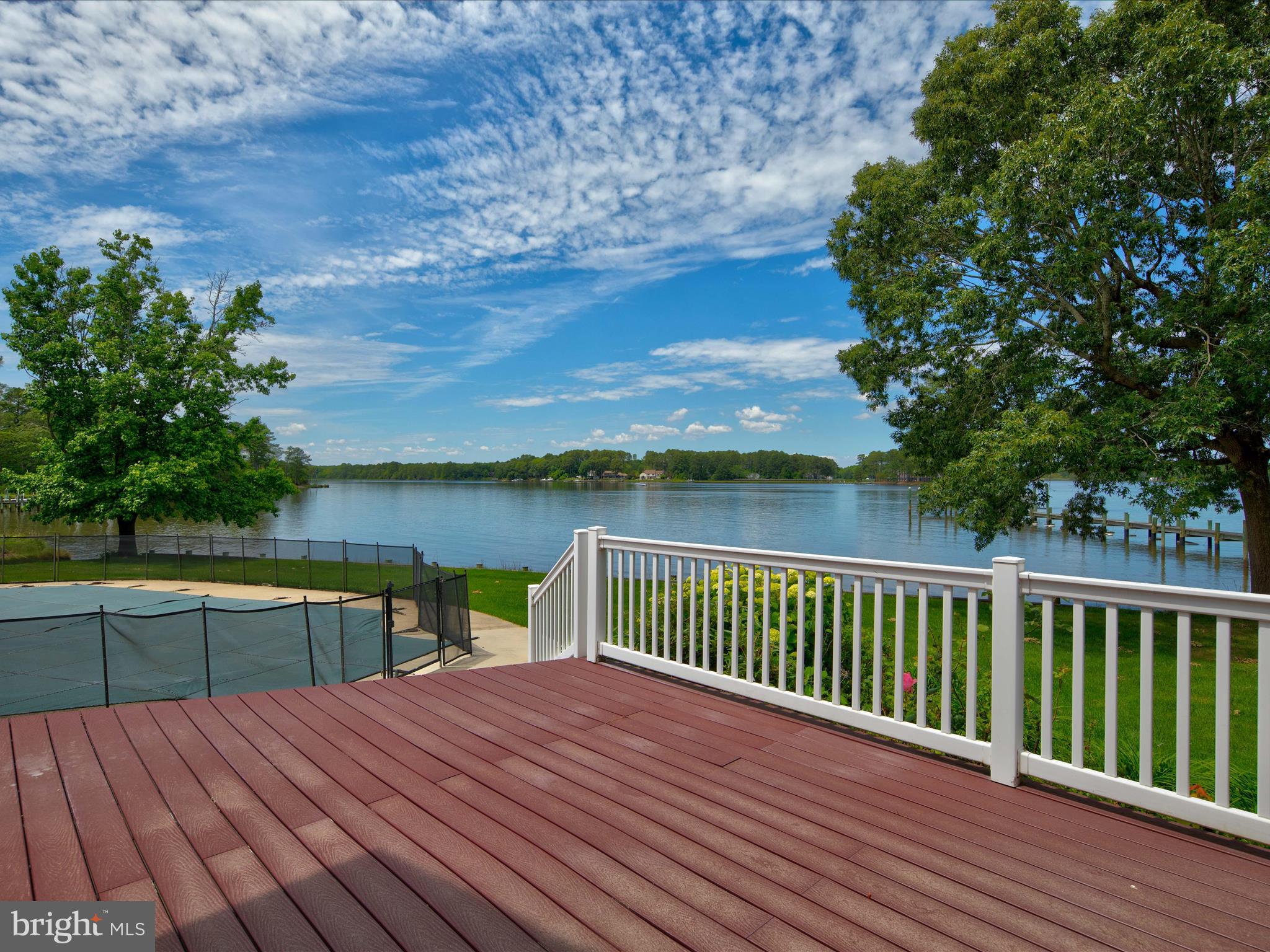 11114 Spring Branch Lane Berlin, MD 21811 - Photo 23 of 75 a view of a wooden deck with lake view