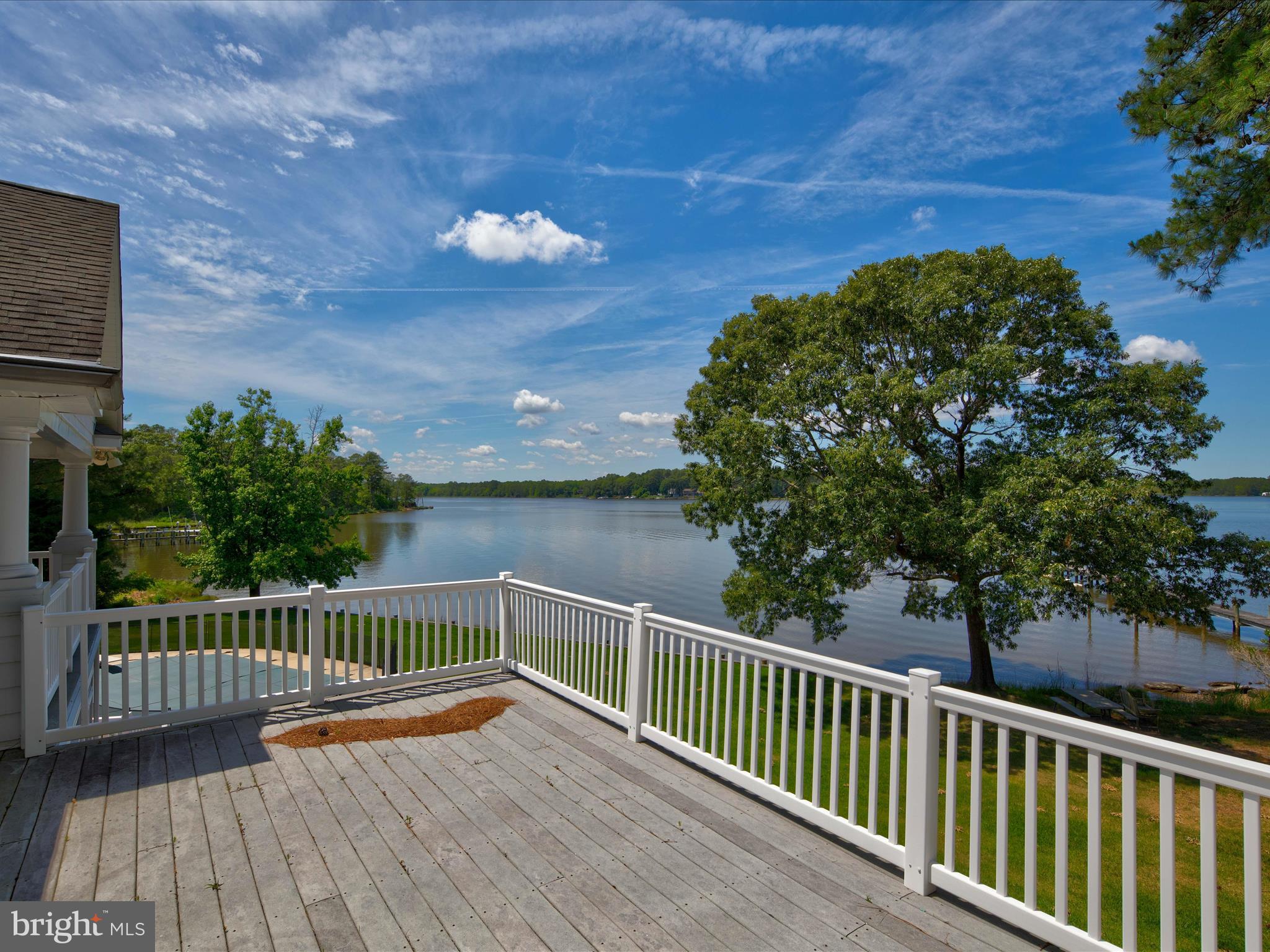11114 Spring Branch Lane Berlin, MD 21811 - Photo 31 of 75 a view of balcony with wooden floor and fence