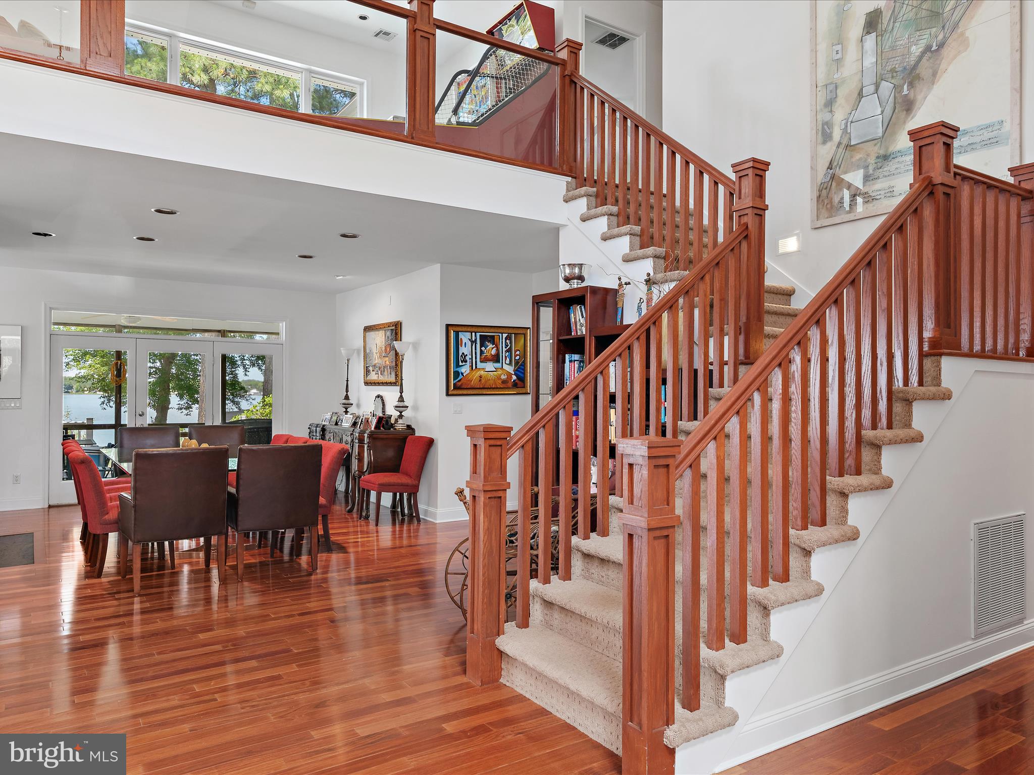 11114 Spring Branch Lane Berlin, MD 21811 - Photo 32 of 75 a view of entryway and hall with wooden floor