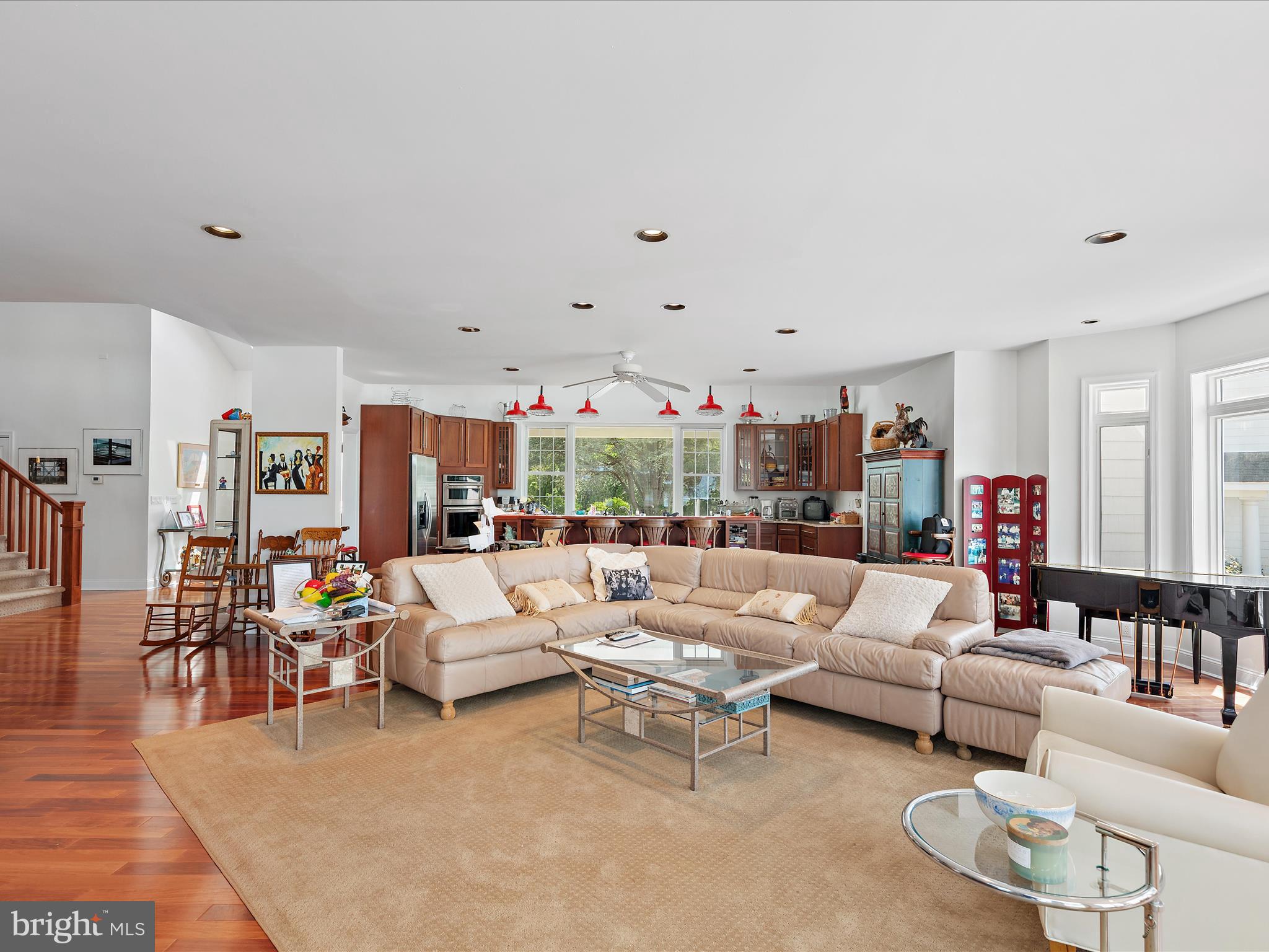 11114 Spring Branch Lane Berlin, MD 21811 - Photo 43 of 75 a living room with furniture and a large window