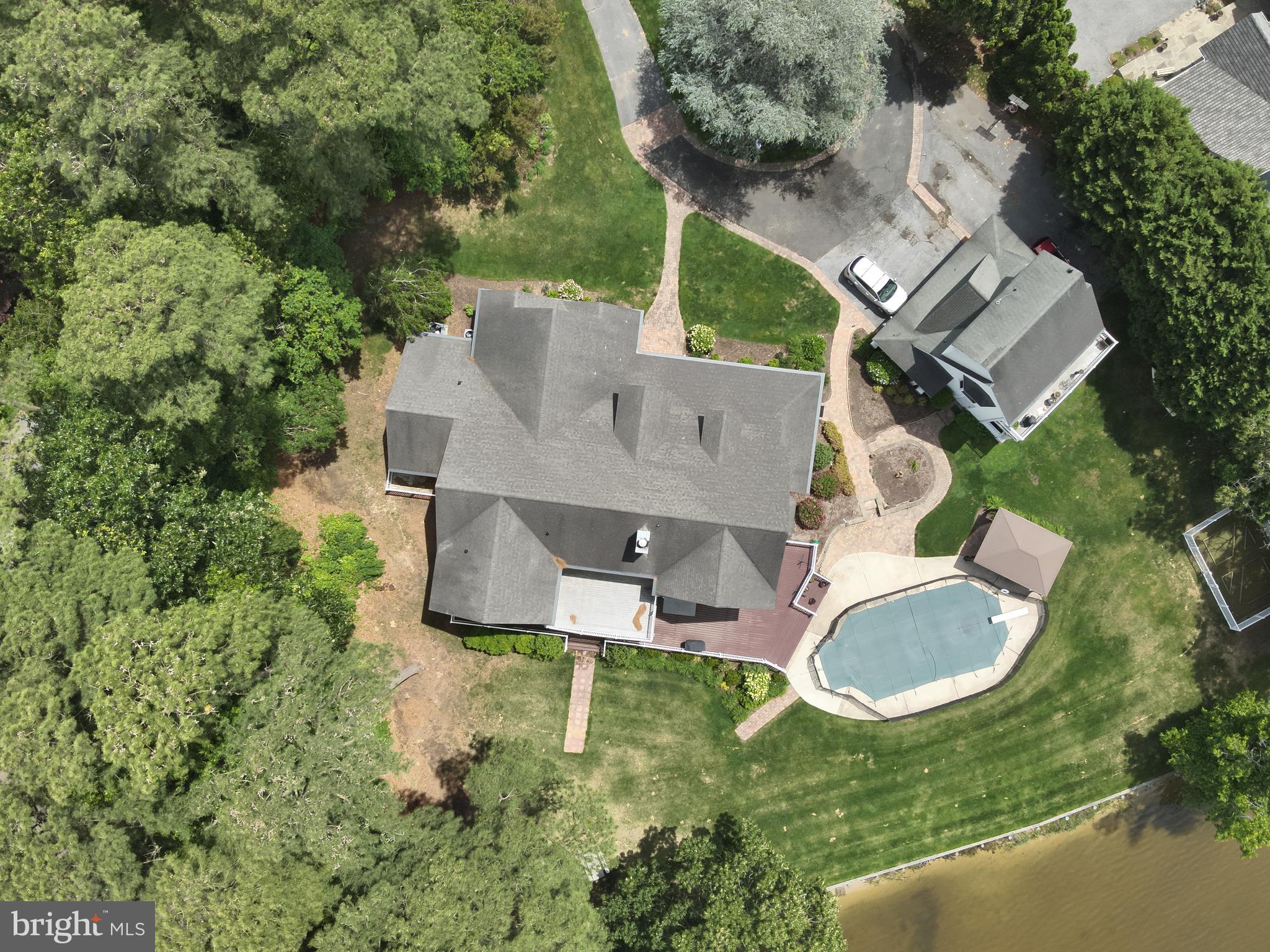 11114 Spring Branch Lane Berlin, MD 21811 - Photo 65 of 75 an aerial view of residential house with outdoor space and trees all around