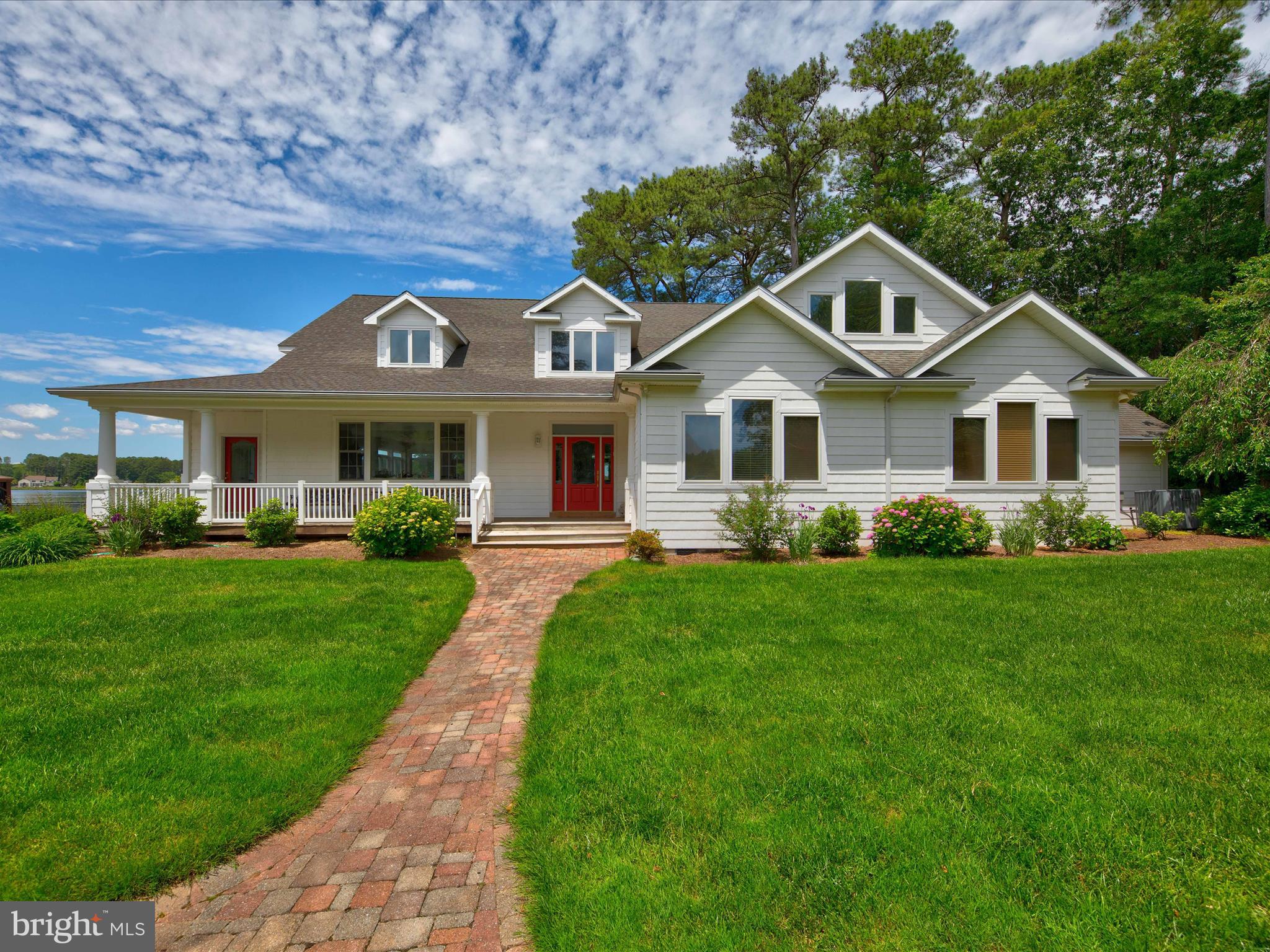 11114 Spring Branch Lane Berlin, MD 21811 - Photo 8 of 75 a front view of a house with a yard