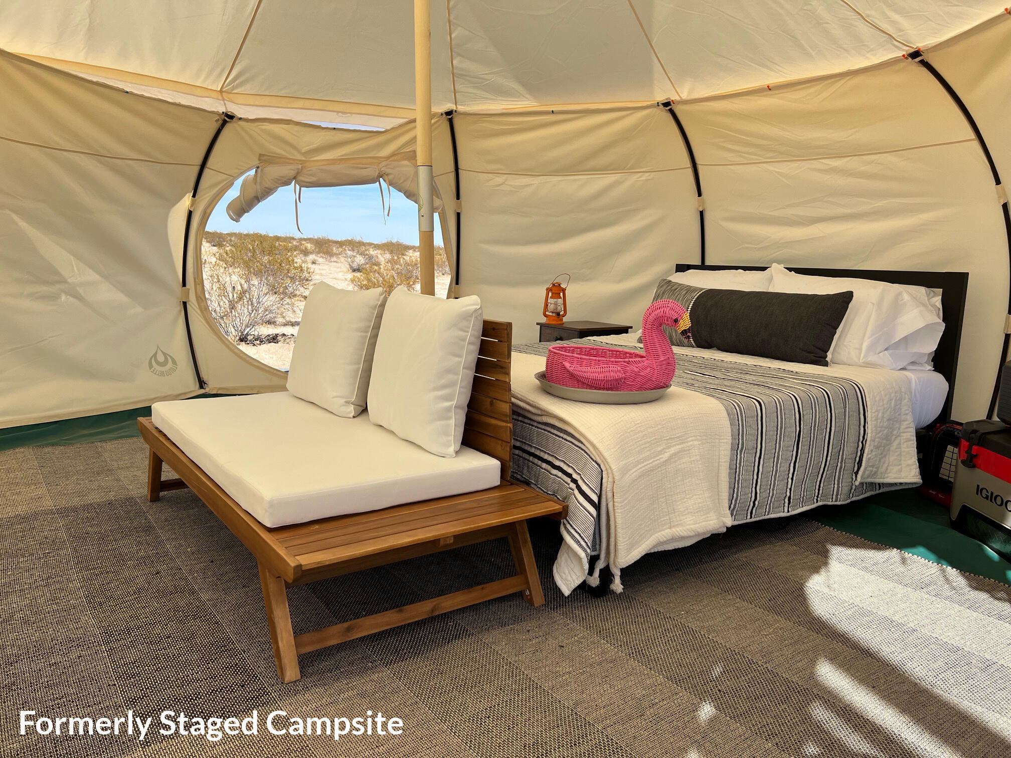 2100 Copper Moon Lane Joshua Tree, CA 92252 - Photo 14 of 28 a bedroom with a bed a window and couch