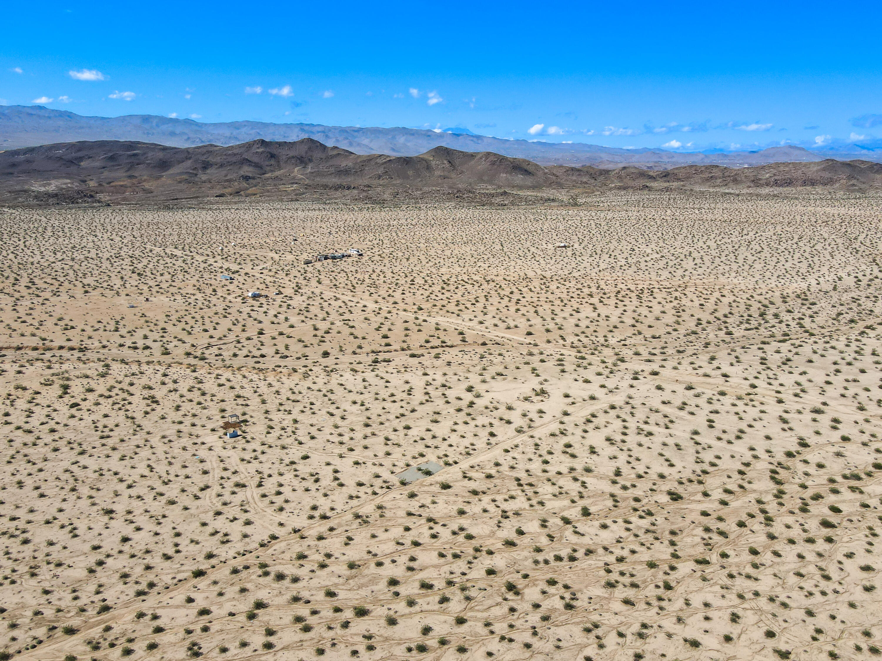 2100 Copper Moon Lane Joshua Tree, CA 92252 - Photo 24 of 28 a view of a city & mountain view