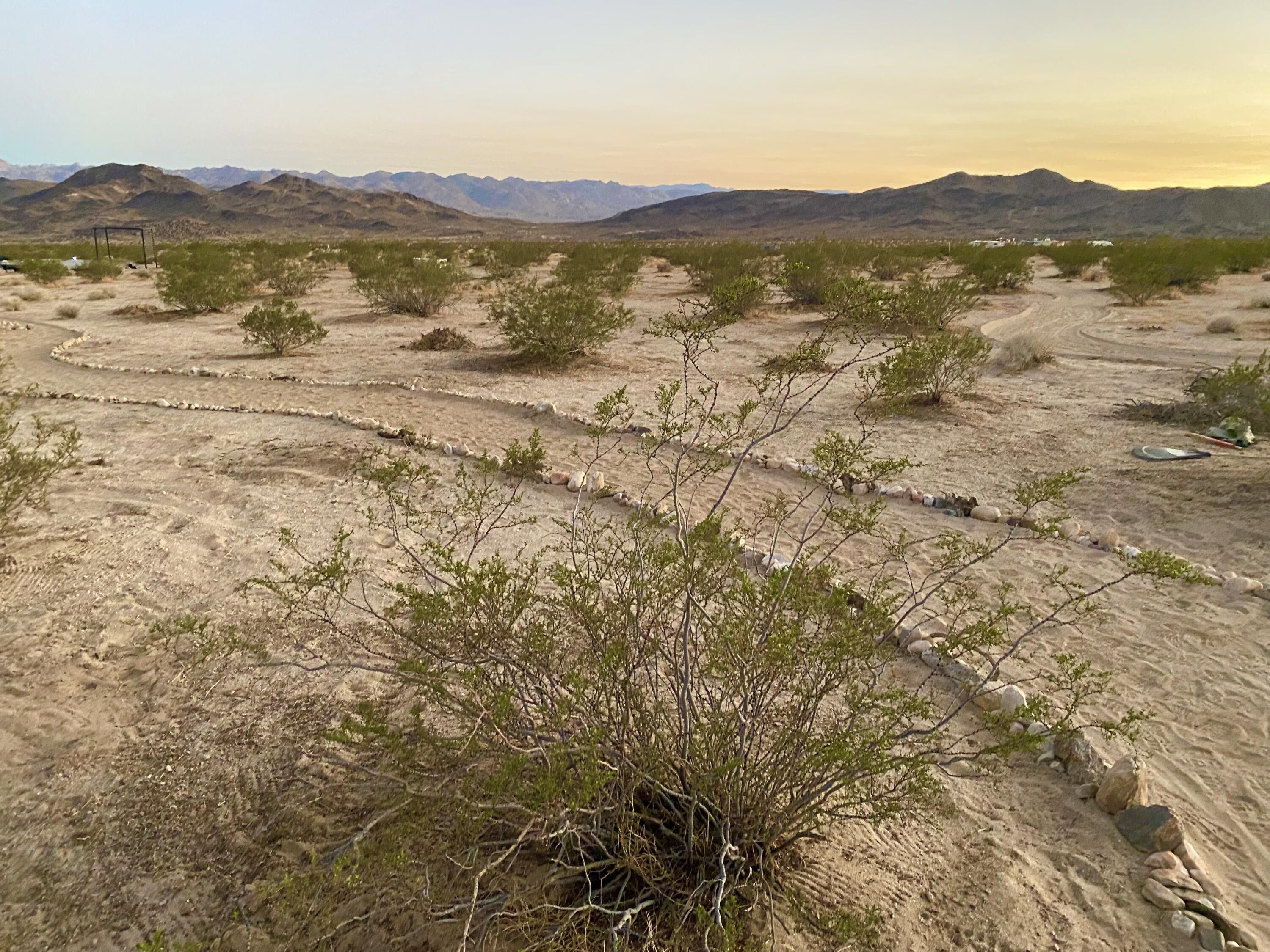 2100 Copper Moon Lane Joshua Tree, CA 92252 - Photo 5 of 28 a view of an ocean and a mountain view