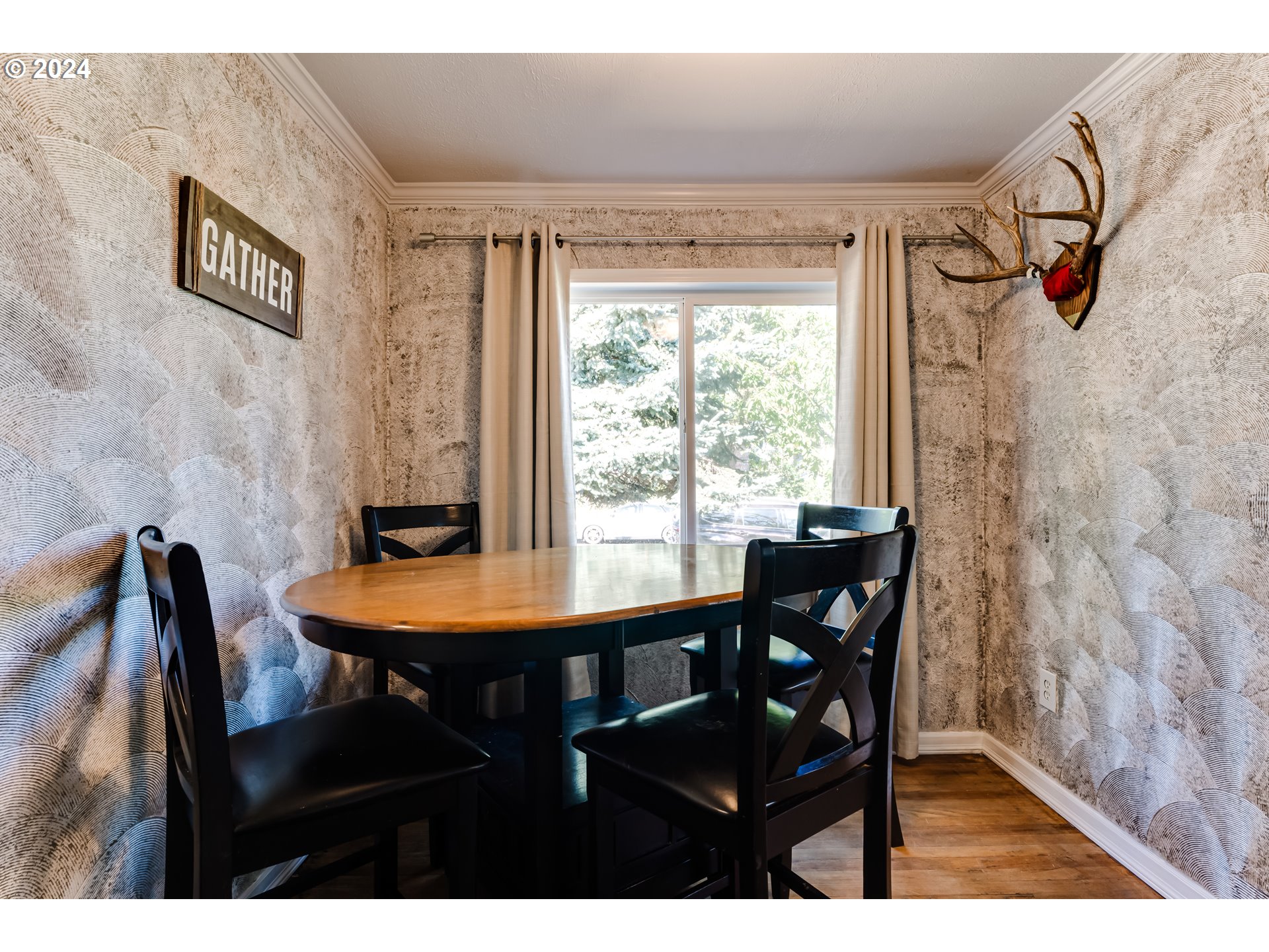 245 North 24th Street Springfield, OR 97477 - Photo 4 of 16 a view of a dining room with furniture and wooden floor