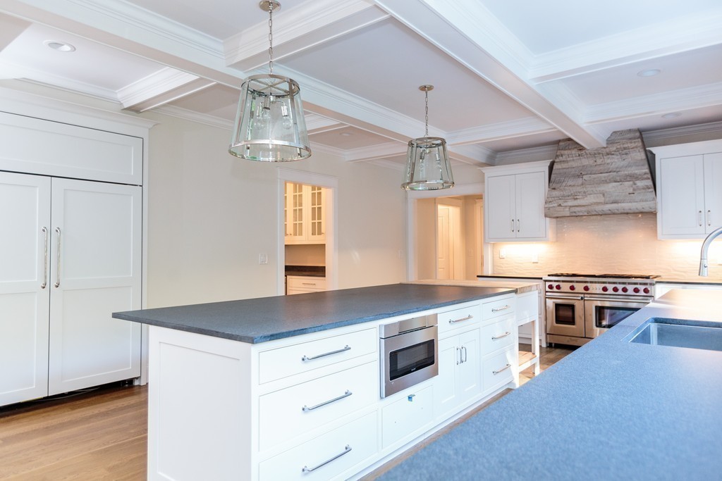 6 Dudley Road Wellesley, MA 02481 - Photo 8 of 21 a kitchen with stainless steel appliances granite countertop a stove and a sink