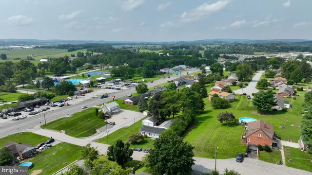 a view of a house with a back yard