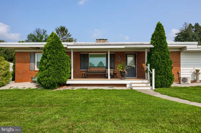 front view of house with a yard
