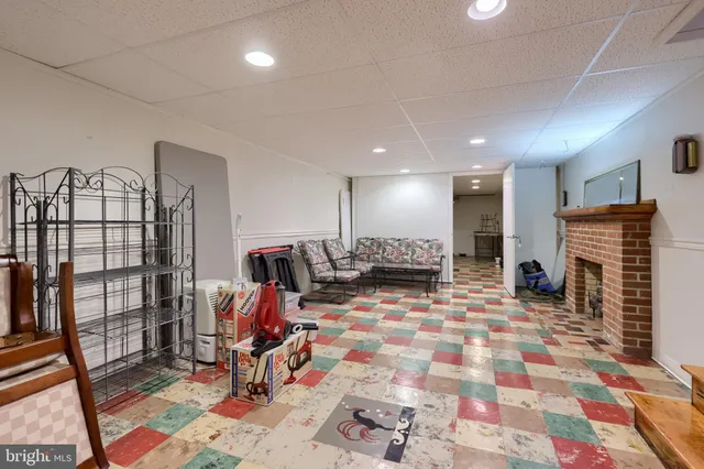 a bathroom with a sink a mirror and a shower